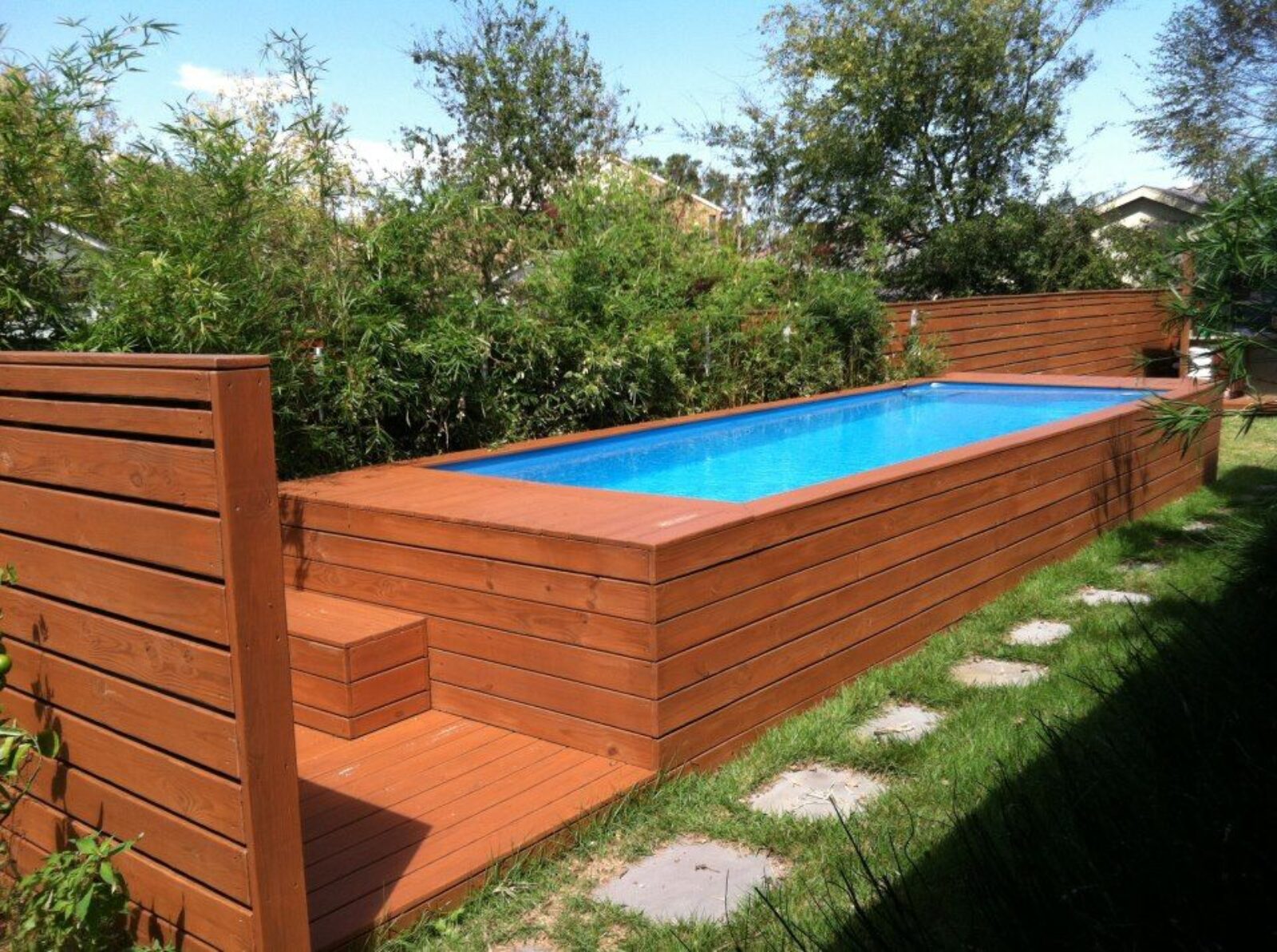 A creative reuse of a dumpster as a pool.