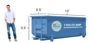 Jordan standing in front of a 40-yard dumpster (old design).
