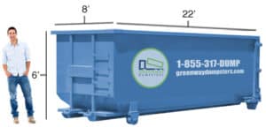 Jordan standing in front of a 30-yard dumpster (old design).