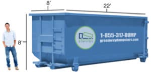 Jordan standing in front of a 40-yard dumpster (old design).
