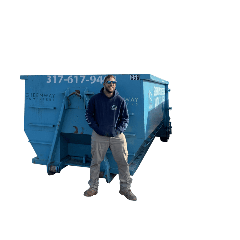Jordan standing in front of a 20-yard dumpster for size comparison.