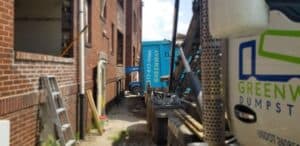 A regular dumpster placed in a historical area of Indianapolis